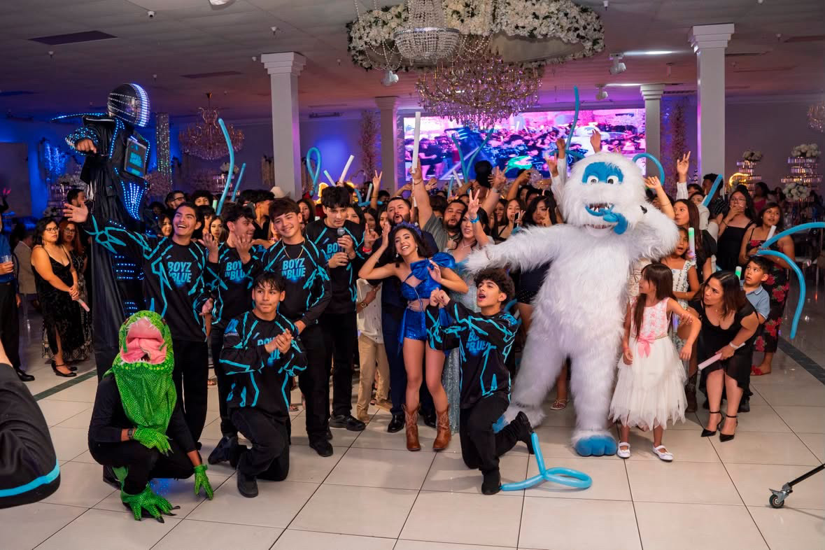 BOYZ IN BLUE LED robot on stilts working a packed dance floor