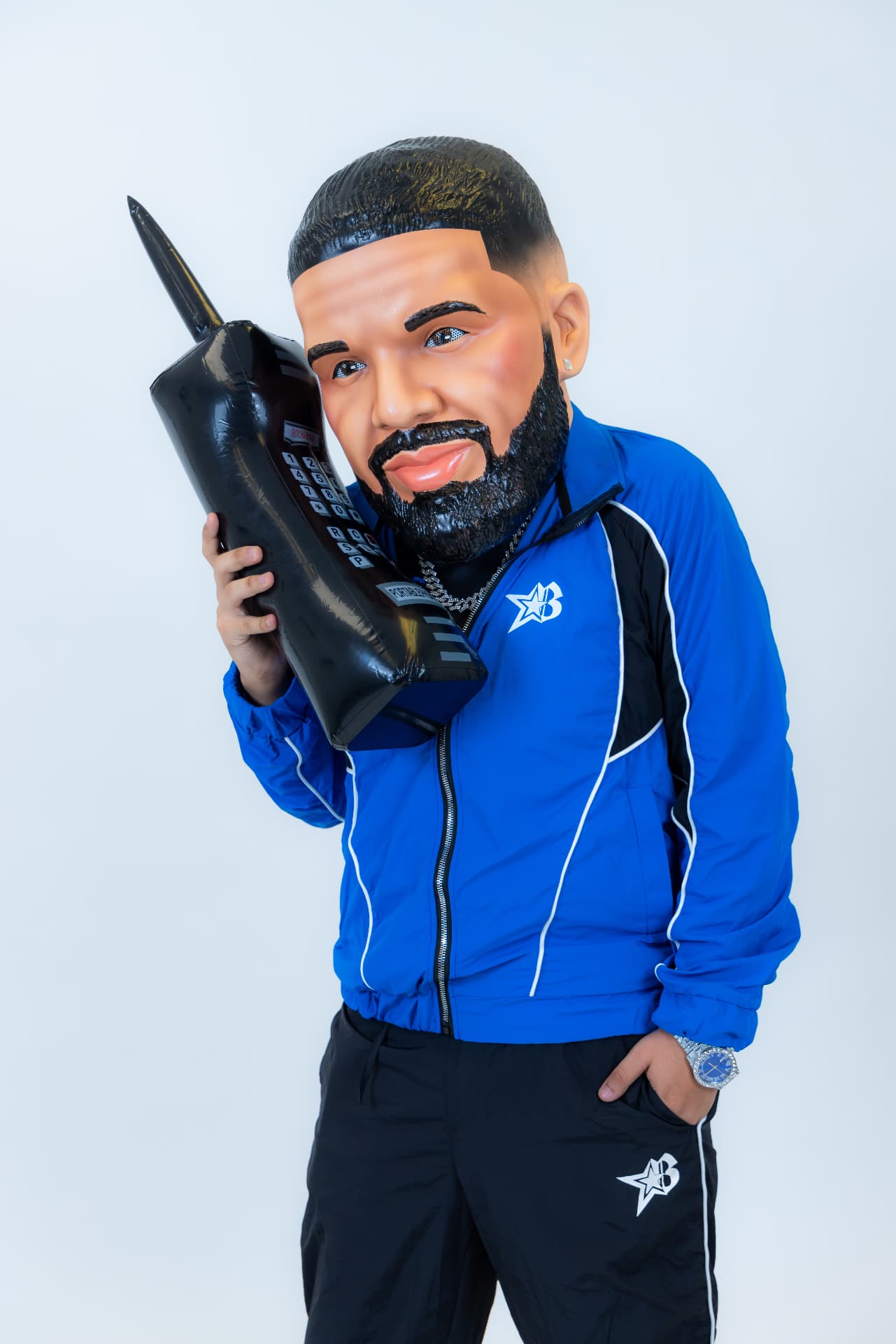 BOYZ IN BLUE Drake character with oversized phone prop